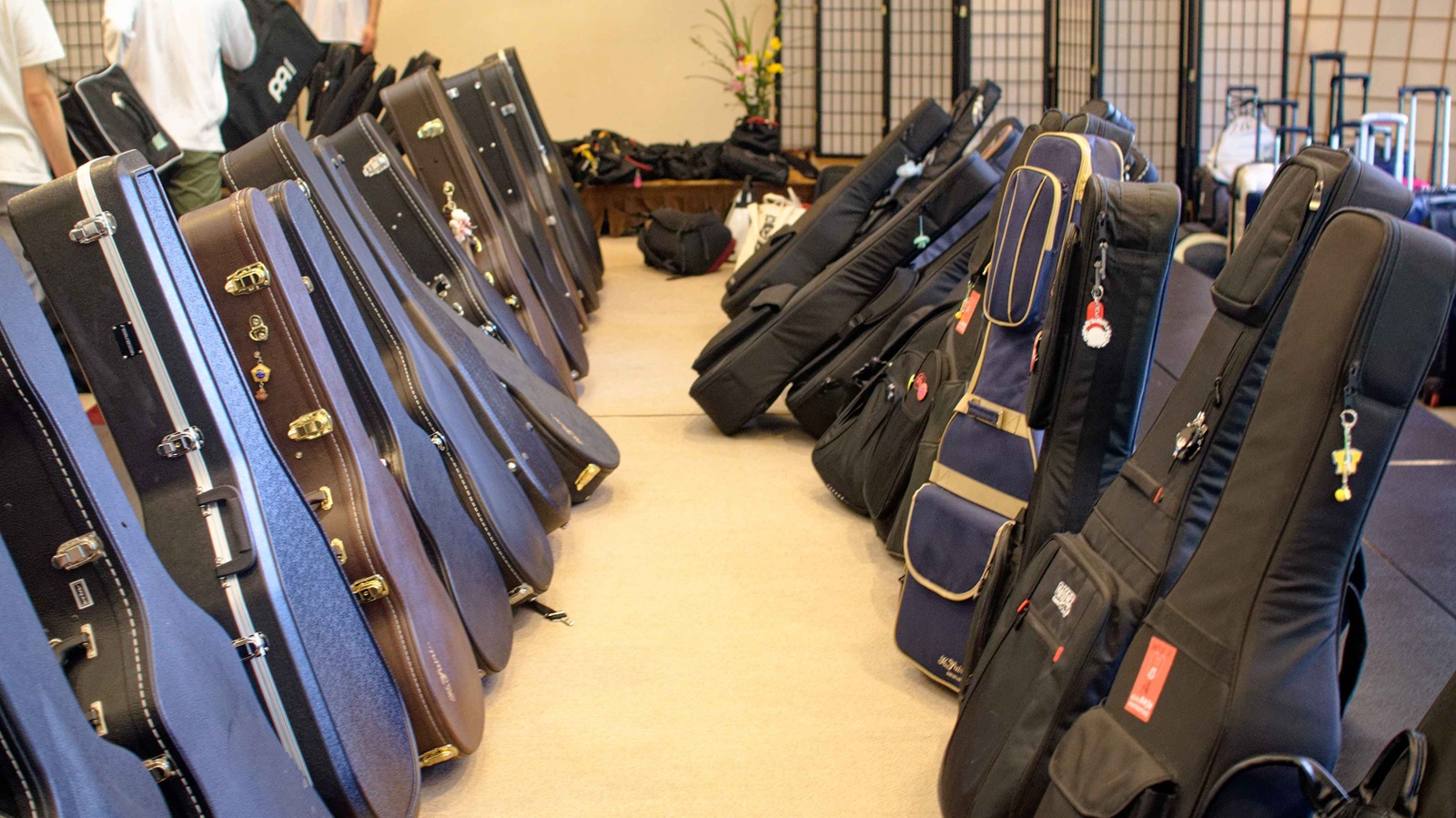 Guitar cases lined up in the great hall where the band's summer camp was held.